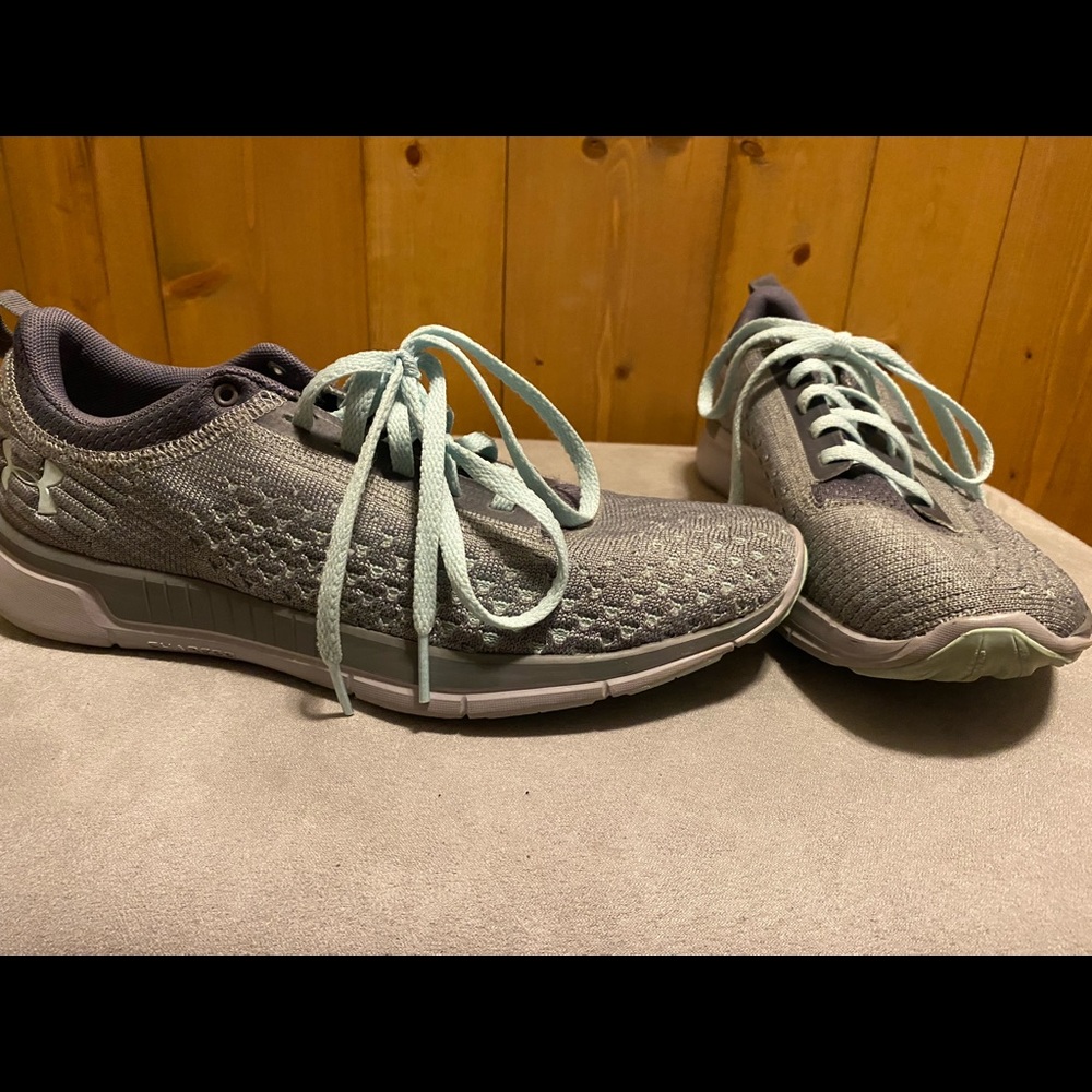 Gray Under Amour tennis shoes